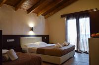 Posteľ alebo postele v izbe v ubytovaní Filippion Hotel