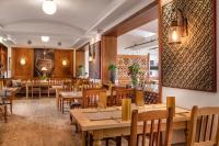 Reštaurácia alebo iné gastronomické zariadenie v ubytovaní MONDI Hotel am Grundlsee