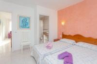 Posteľ alebo postele v izbe v ubytovaní Apartamento Cala en Forcat 36