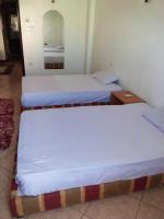Postel nebo postele na pokoji v ubytování Tara Apartments