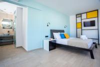 Postel nebo postele na pokoji v ubytování Faliraki Premium Hotel