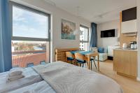 Posteľ alebo postele v izbe v ubytovaní Comfort Apartments Granaria