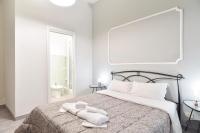 Postel nebo postele na pokoji v ubytování GuestHouse o Affittacamere Magenta Baylon Suite