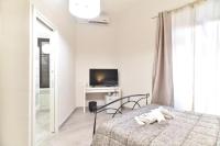 Postel nebo postele na pokoji v ubytování GuestHouse o Affittacamere Magenta Baylon Suite