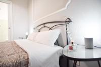 Postel nebo postele na pokoji v ubytování GuestHouse o Affittacamere Magenta Baylon Suite