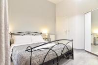 Postel nebo postele na pokoji v ubytování GuestHouse o Affittacamere Magenta Baylon Suite