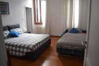 Posteľ alebo postele v izbe v ubytovaní Castello 5888 A, Santa Marina, Calle Marcello, Calle