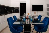A television and/or entertainment centre at Maison Lux
