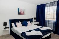A bed or beds in a room at Maison Lux