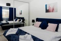 A bed or beds in a room at Maison Lux