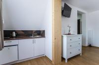 Kuchyňa alebo kuchynka v ubytovaní Willa Mała Łąka Jacuzzi & Sauna