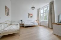 Posteľ alebo postele v izbe v ubytovaní DR Apartments - Fryderyk