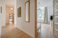 Televízia a/alebo spoločenská miestnosť v ubytovaní DR Apartments - Fryderyk