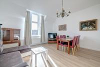 Televízia a/alebo spoločenská miestnosť v ubytovaní DR Apartments - Fryderyk