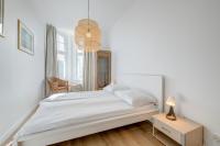 Posteľ alebo postele v izbe v ubytovaní DR Apartments - Fryderyk