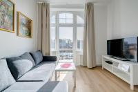 Televízia a/alebo spoločenská miestnosť v ubytovaní DR Apartments - Fryderyk