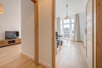 Televízia a/alebo spoločenská miestnosť v ubytovaní DR Apartments - Fryderyk