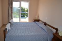 Postel nebo postele na pokoji v ubytování Petasos Apartments 1
