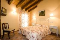 Postel nebo postele na pokoji v ubytování Hotel Rural El Pilaret