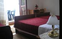 Łóżko lub łóżka w pokoju w obiekcie Guest House Hazdovac