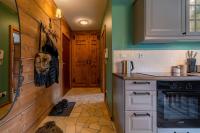 Kuchyňa alebo kuchynka v ubytovaní Apartament Zielony Blisko Krupówek