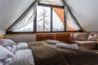 Posteľ alebo postele v izbe v ubytovaní B&B Art House Szymaszkowa 1