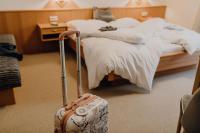 Posteľ alebo postele v izbe v ubytovaní Dorfcafe Unken Hotelpension sWirtshaus im Dorf