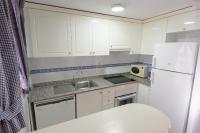 Kuchyňa alebo kuchynka v ubytovaní Apartamentos Nuevo México C 462