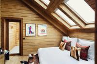 Posteľ alebo postele v izbe v ubytovaní El Lodge, Ski & Spa