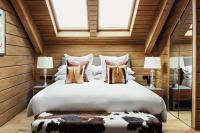 Posteľ alebo postele v izbe v ubytovaní El Lodge, Ski & Spa
