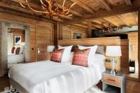 Posteľ alebo postele v izbe v ubytovaní El Lodge, Ski & Spa
