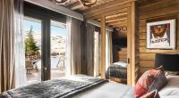 Posteľ alebo postele v izbe v ubytovaní El Lodge, Ski & Spa
