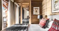 Posteľ alebo postele v izbe v ubytovaní El Lodge, Ski & Spa