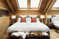 Posteľ alebo postele v izbe v ubytovaní El Lodge, Ski & Spa