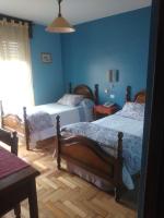 A bed or beds in a room at Hotel Solpor