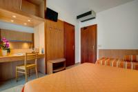 Posteľ alebo postele v izbe v ubytovaní Hotel Jalisco