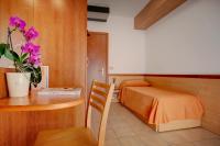 Posteľ alebo postele v izbe v ubytovaní Hotel Jalisco