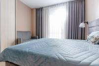 Postel nebo postele na pokoji v ubytování Resort Apartamenty Klifowa Rewal 41