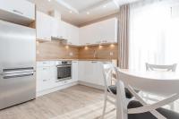 Kuchyň nebo kuchyňský kout v ubytování Resort Apartamenty Klifowa Rewal 41