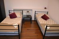Łóżko lub łóżka w pokoju w obiekcie Apartament i pokoje Szalawa