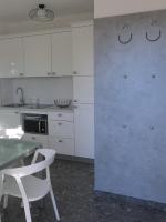 Kuchyň nebo kuchyňský kout v ubytování Apartments Rea