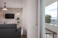 TV a/nebo společenská místnost v ubytování APARTMANI Mirona - Tučepi