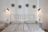 Postel nebo postele na pokoji v ubytování APARTMANI Mirona - Tučepi