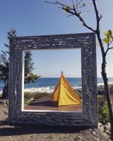 a picture of a tent in a frame on the beach at Bridge12th B&amp;B in Yanliau