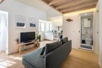 TV a/nebo společenská místnost v ubytování CAROL BEACH HOUSE