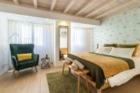 Postel nebo postele na pokoji v ubytování CAROL BEACH HOUSE