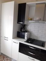 Kuchyňa alebo kuchynka v ubytovaní Apartment Summer Dreams