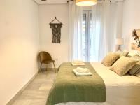 Posteľ alebo postele v izbe v ubytovaní Homely Málaga Larios