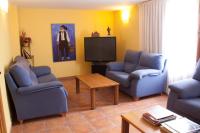 A television and/or entertainment centre at Hotel Casa Duaner