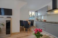 Kuchnia lub aneks kuchenny w obiekcie Apartament na Sportowej